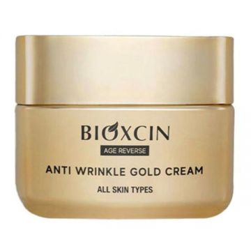 Crema Bioxcin anti-imbatranire multi-activa, imbogatita cu proteina de matase si aur de 24 Karate, 50 ml